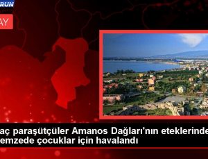 Yamaç paraşütçüler Amanos Dağları’nın eteklerinden depremzede çocuklar için havalandı